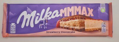 Молочный шоколад Milka Strawberry Cheesecake молочний з начинкою зі смаком чізкейку, полуничною начинкою 300г 471 фото
