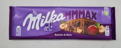 Молочний шоколад Milka Raisins & Nuts горіхи та родзинки 300 г 0412 фото
