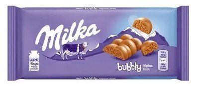 Молочний пористий шоколад Milka Bubbly 95г 0801 фото