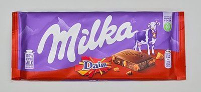 Молочний шоколад Milka Daim 100г 5038 фото