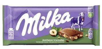 Молочний шоколад Milka Hazelnuts лісовий горіх 90г 0804 фото