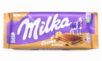 Молочний шоколад Milka Hazelnut Creme Горіховий крем 85 г 5173 фото
